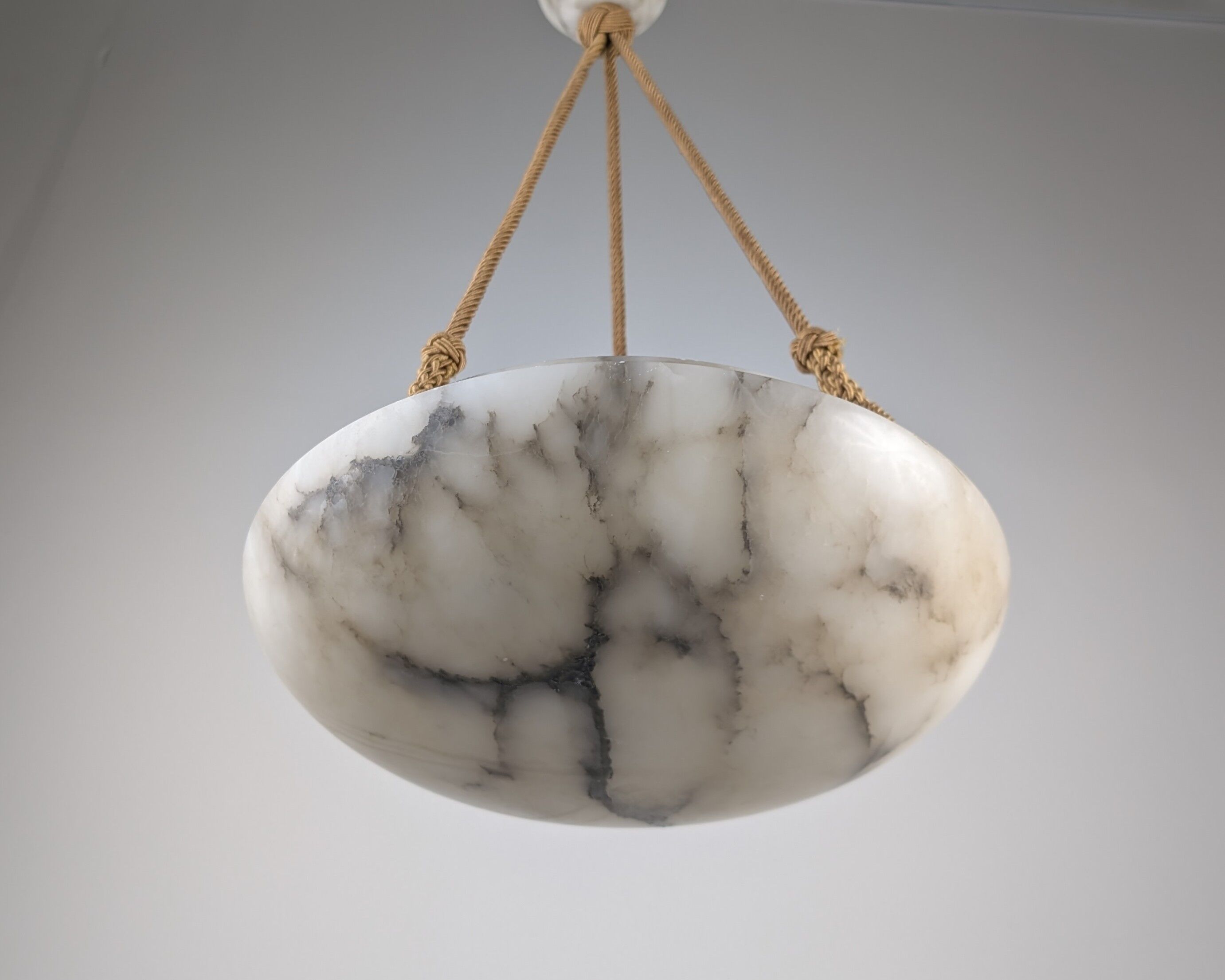 Timeless Art Deco pendant lamp in carved alabaster with black veins, 1920s