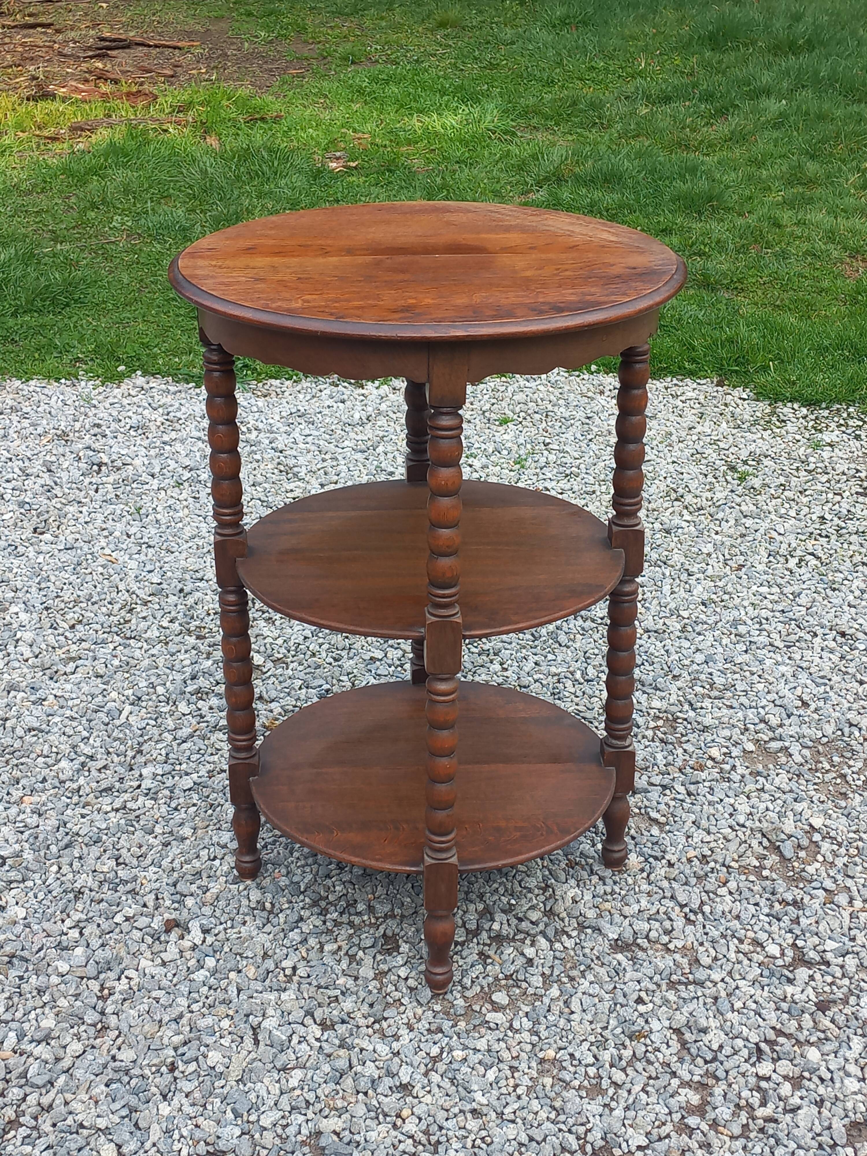 Vintage oak pedestal table with 3 shelves from the 60s