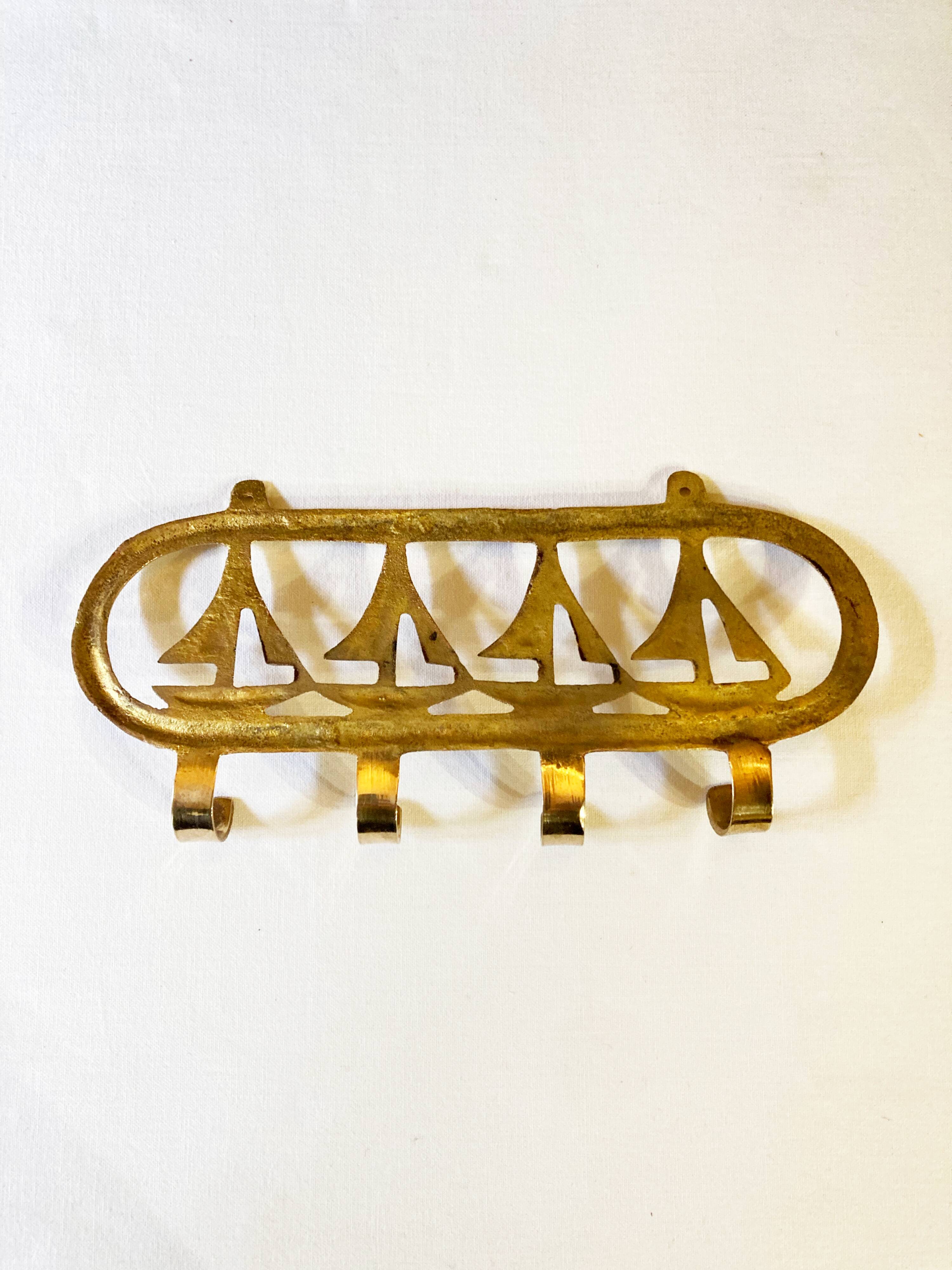 Coat hook in gilded brass, sailboat motifs