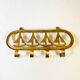 Coat hook in gilded brass, sailboat motifs