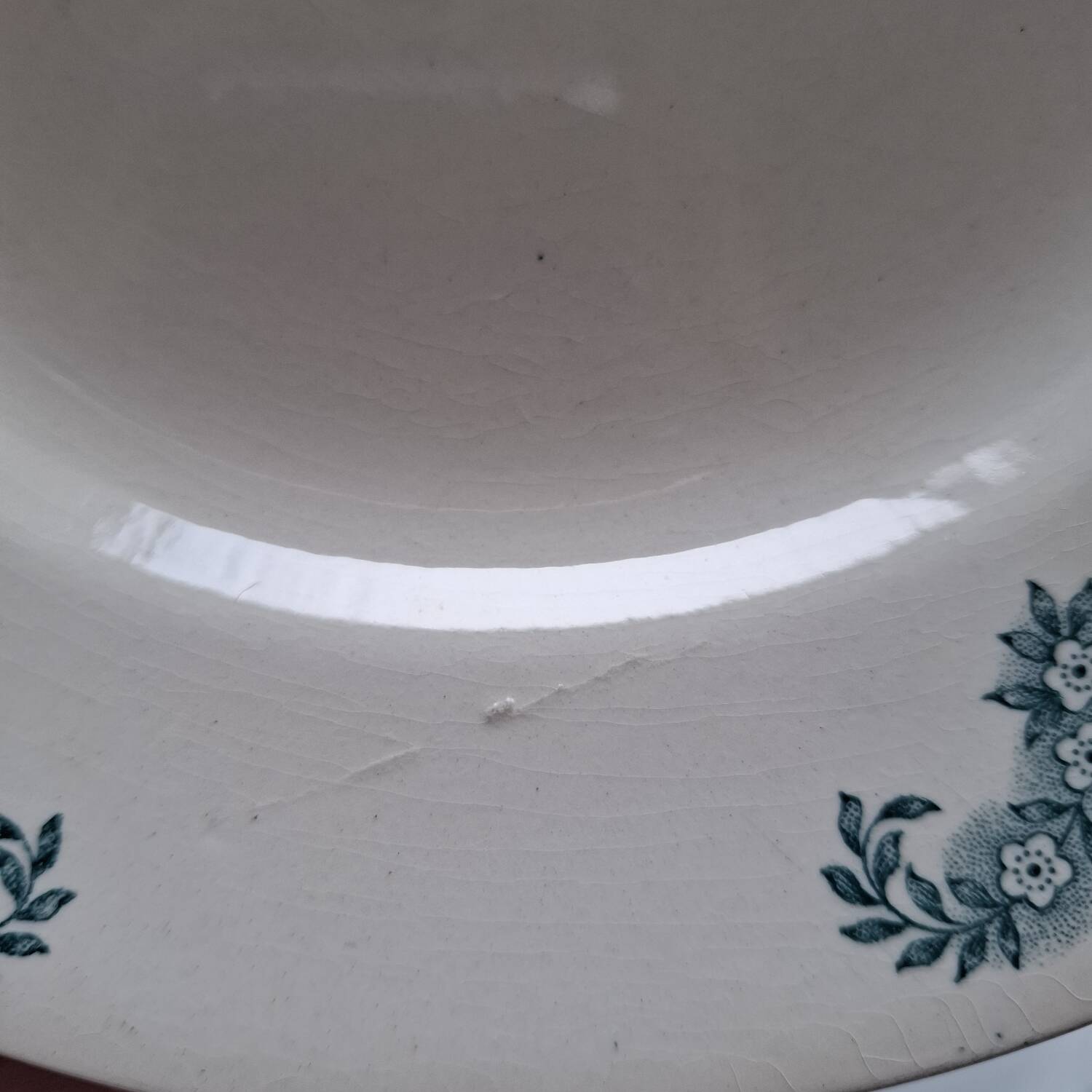 Mismatched old flat plates in iron earthenware