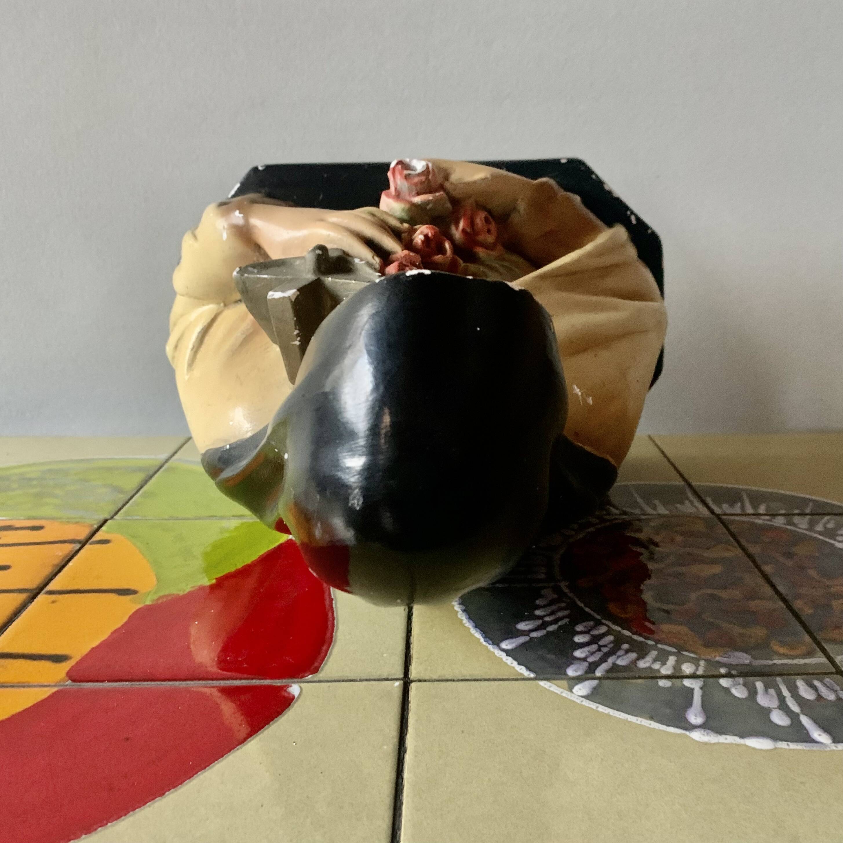 Old plaster bust of Saint Thérèse of Lisieux