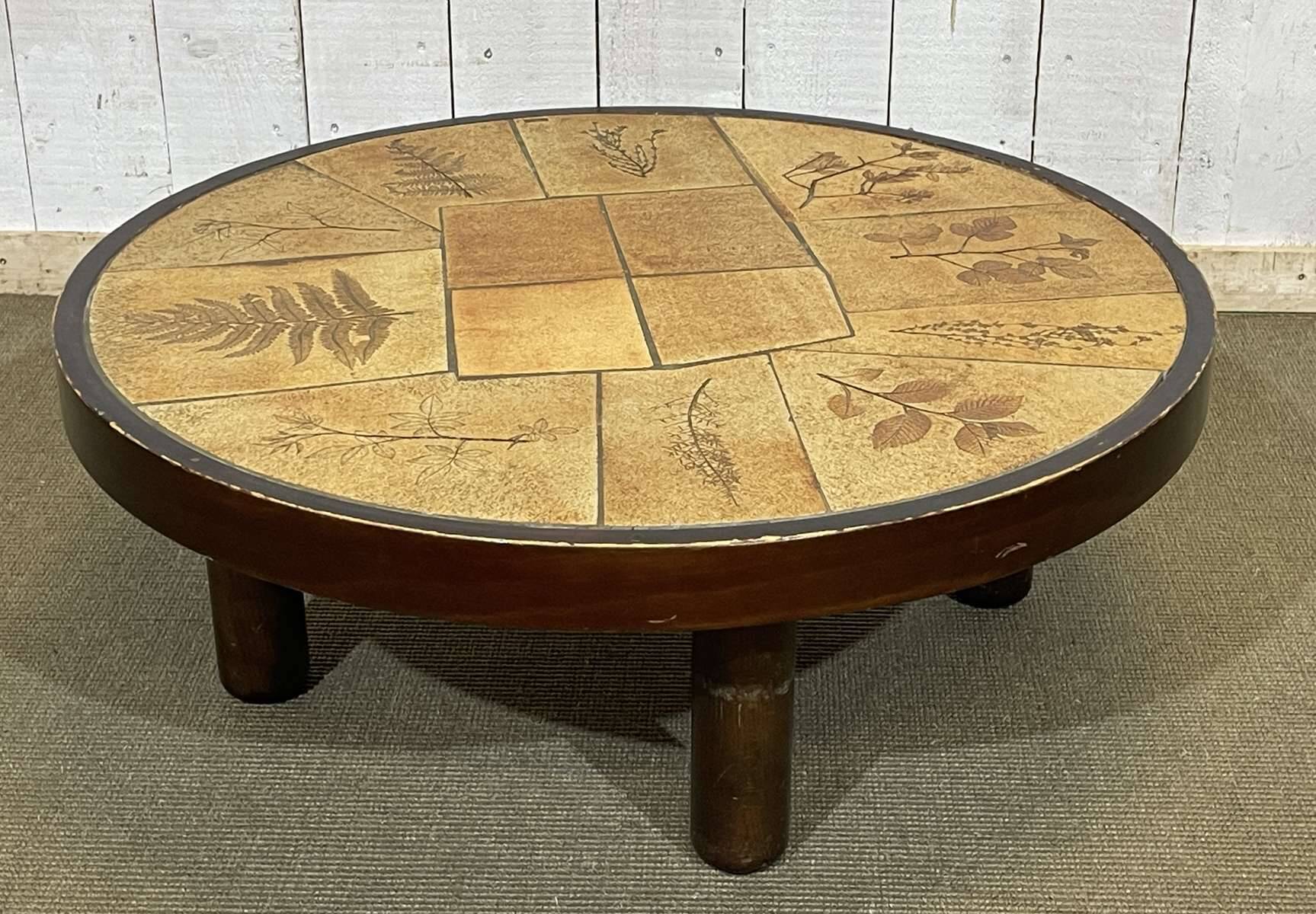 Beech coffee table with a ceramic top featuring a herbarium design.