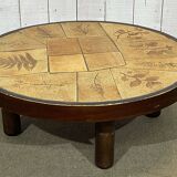 Beech coffee table with a ceramic top featuring a herbarium design.