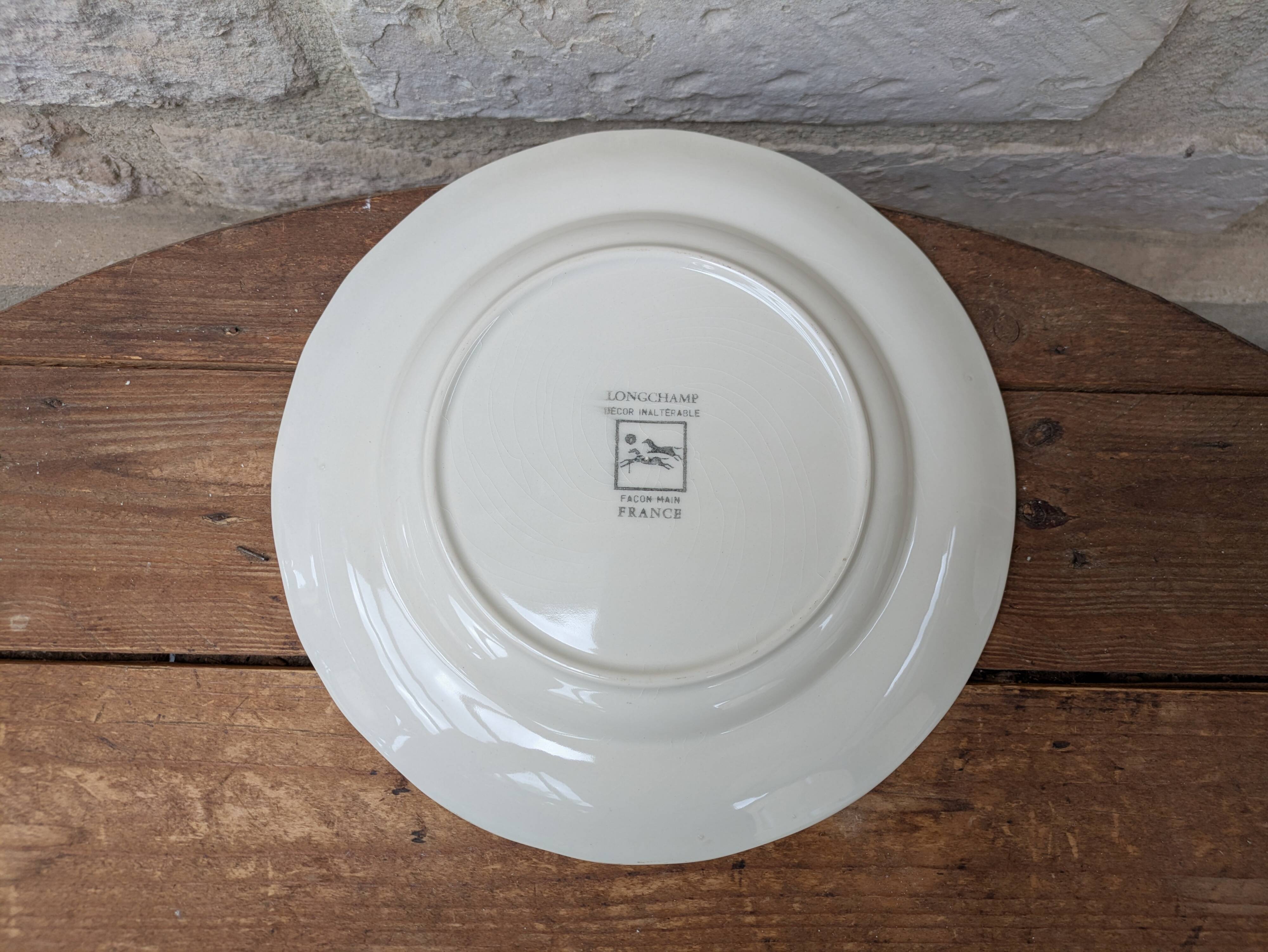 Vintage Longchamp plate handmade with bird and flower decoration, 25.5cm.