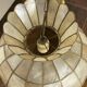 Grande suspension en nacre et laiton 
