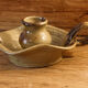 Signed sandstone candle holder