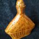 Vintage wicker and braided bamboo bottle