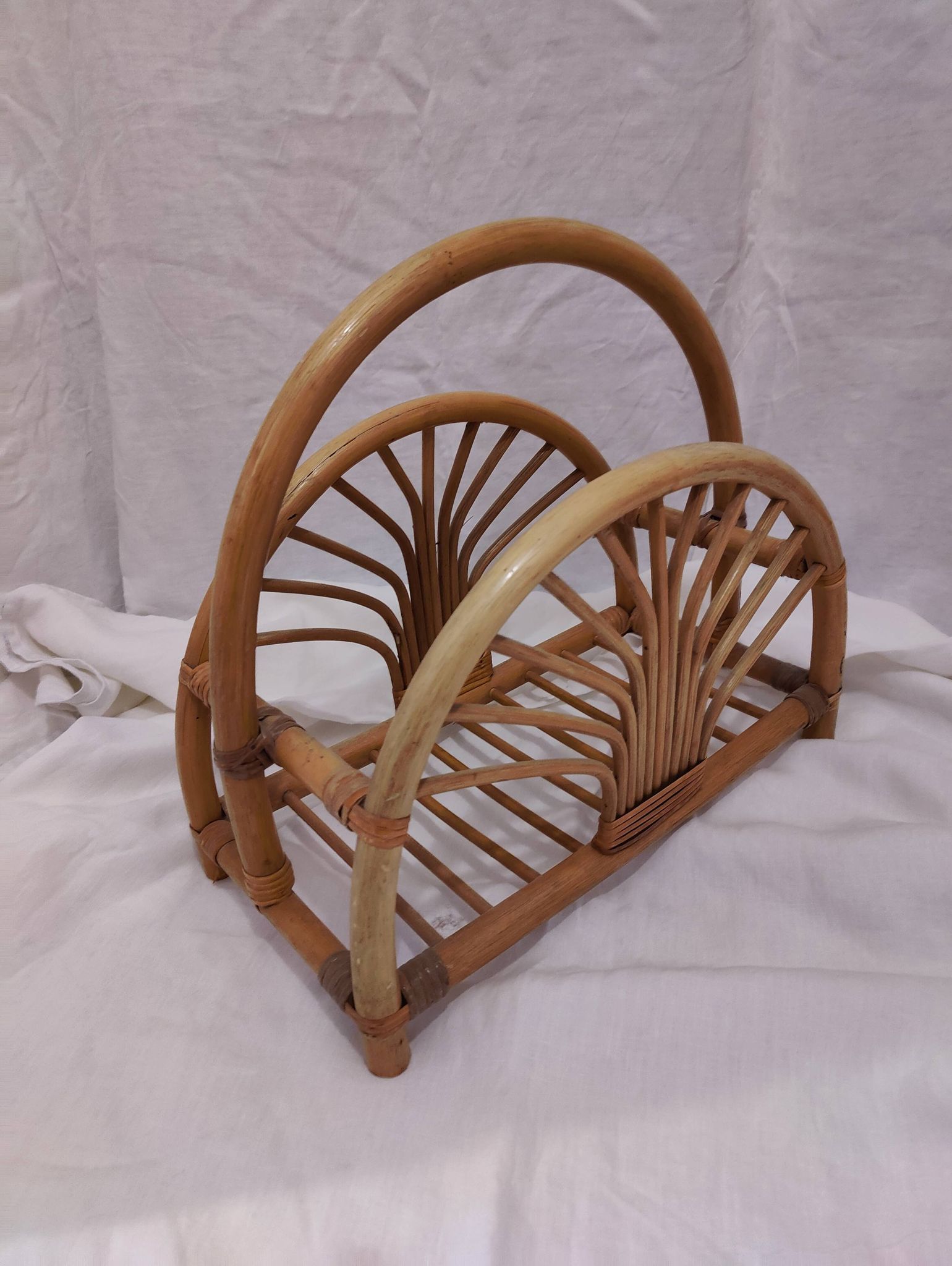 Woven bamboo magazine rack from the 1970s