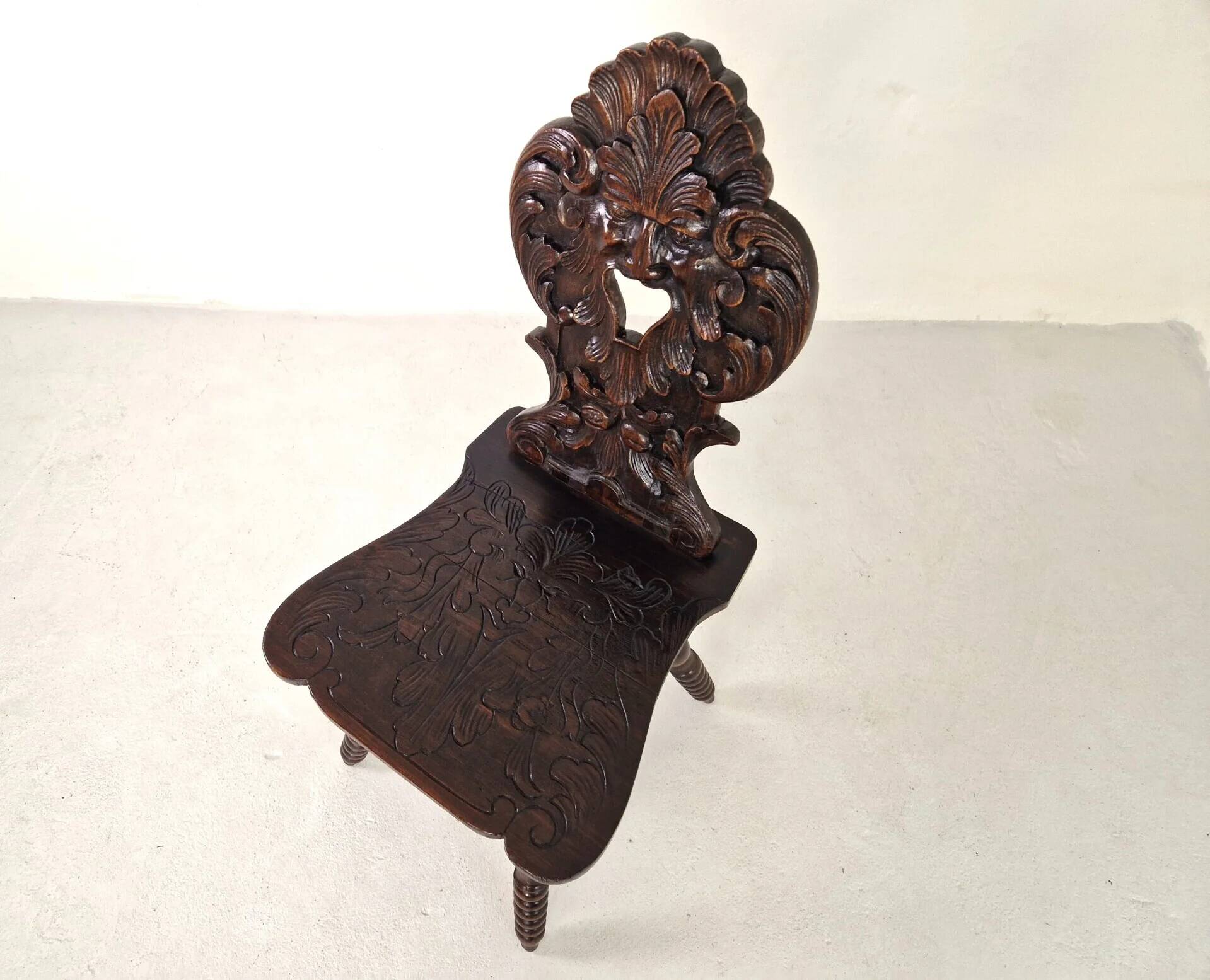 Antique Gothic hall chair with bobbin legs
