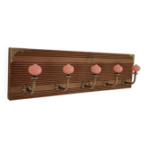 Wall-mounted coat rack with 5 hooks, powder pink ceramic and stained wood, 50 cm.