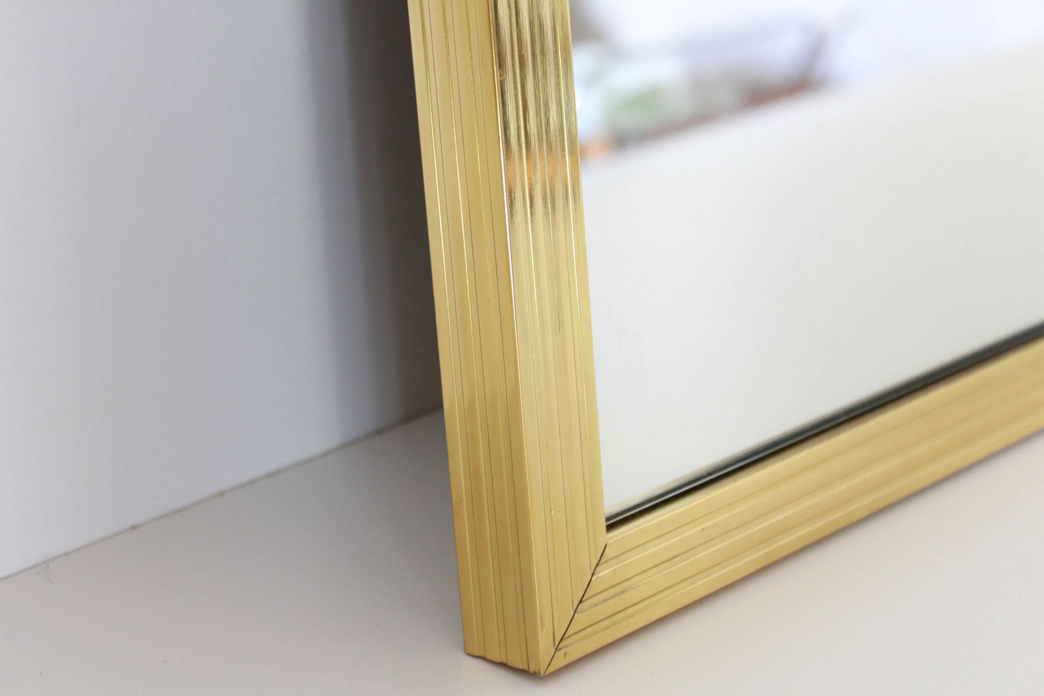 1970s vintage mirror with goldenrod frame