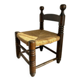 Vintage low chair in the style of Charles Dudouyt – Wooden fireside chair