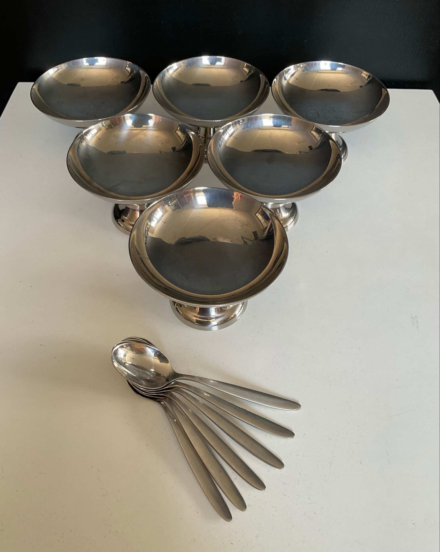 Set of 6 vintage stainless steel ice cream bowls with spoons.