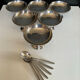Set of 6 vintage stainless steel ice cream bowls with spoons.