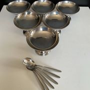 Set of 6 vintage stainless steel ice cream bowls with spoons.