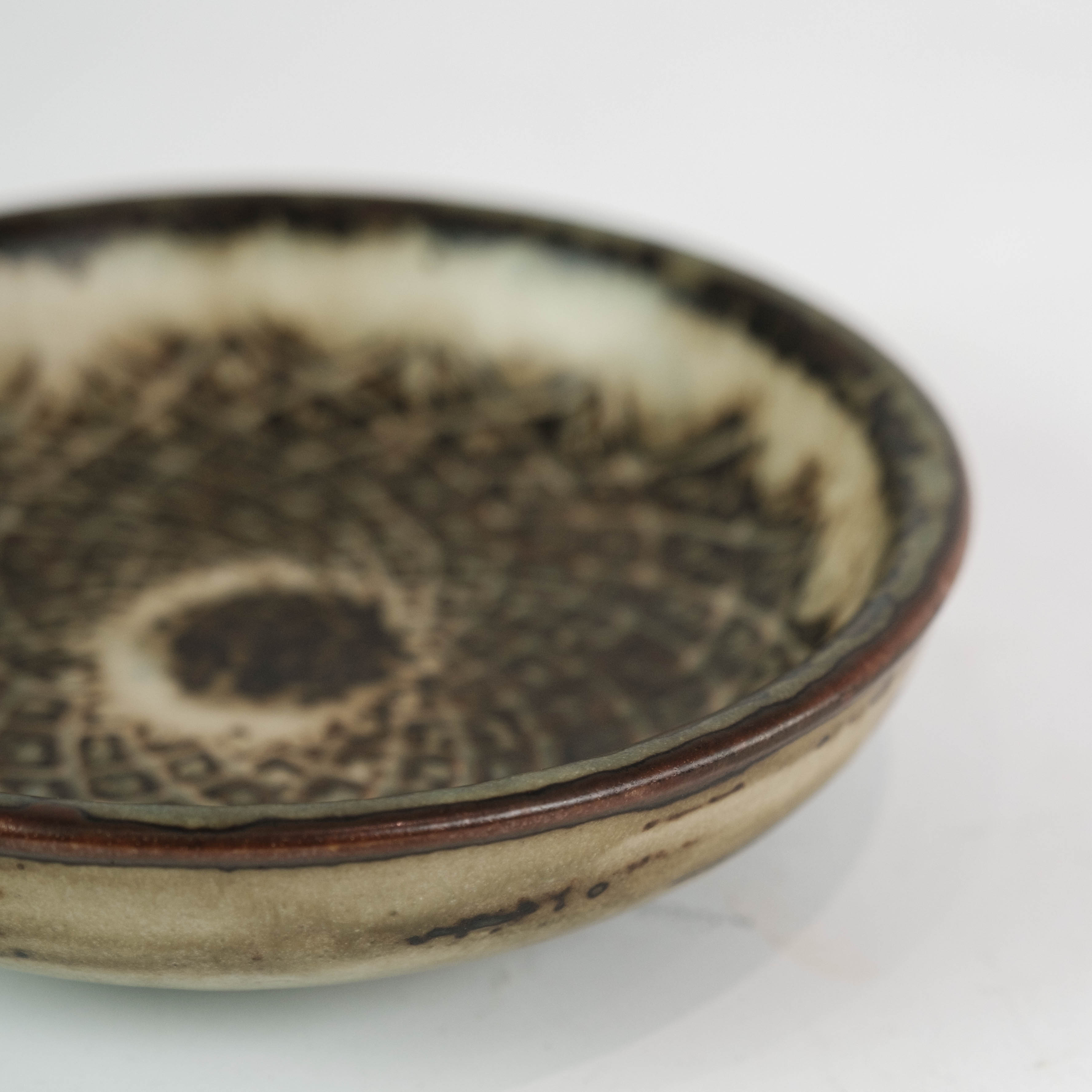 Stoneware bowl in brown colors, no.: 21567 by Gerd Bøgelund for Royal Copenhagen