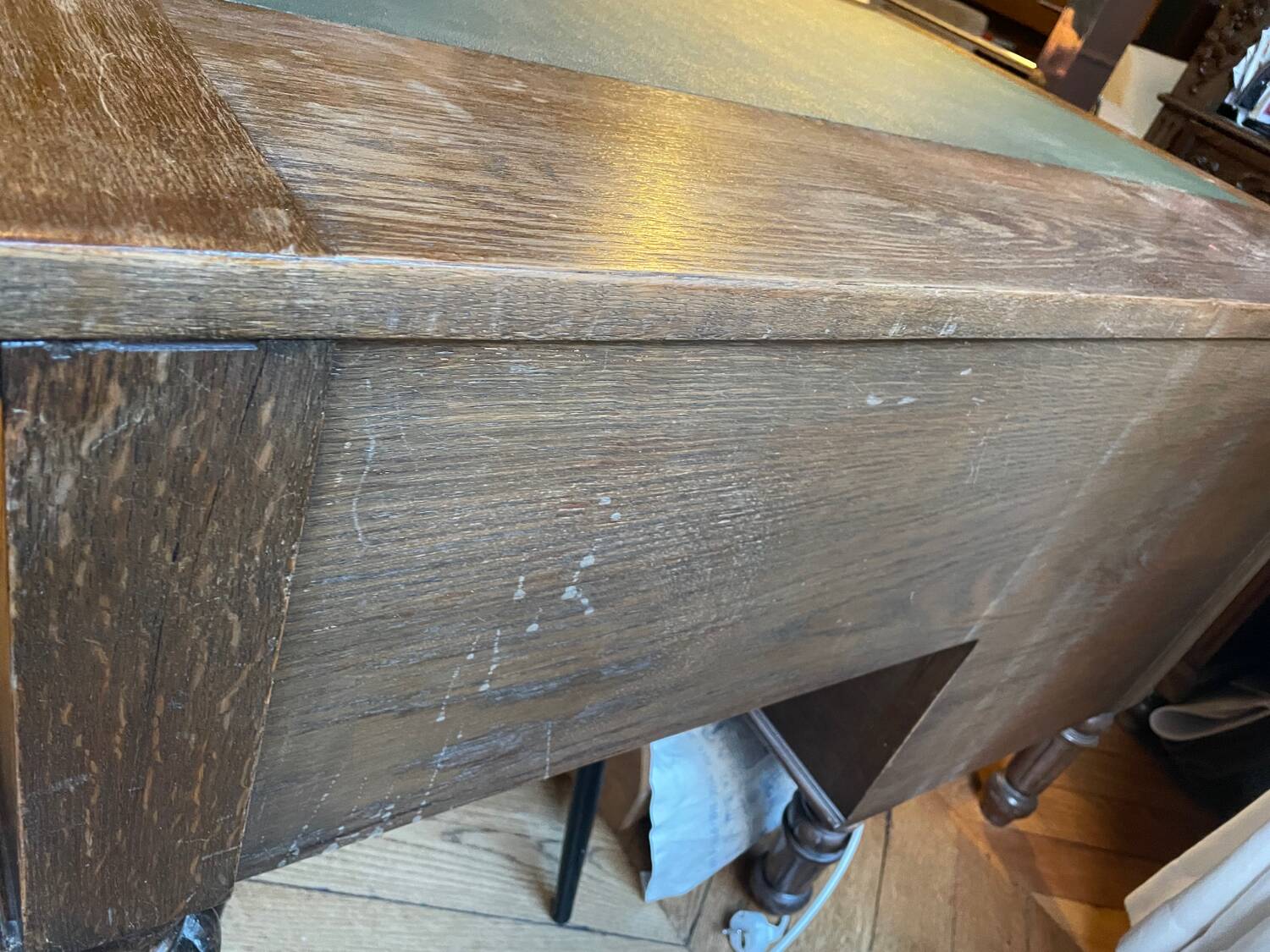 Solid wood desk and green leather writing pad