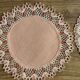 11 pink hand-lace coasters