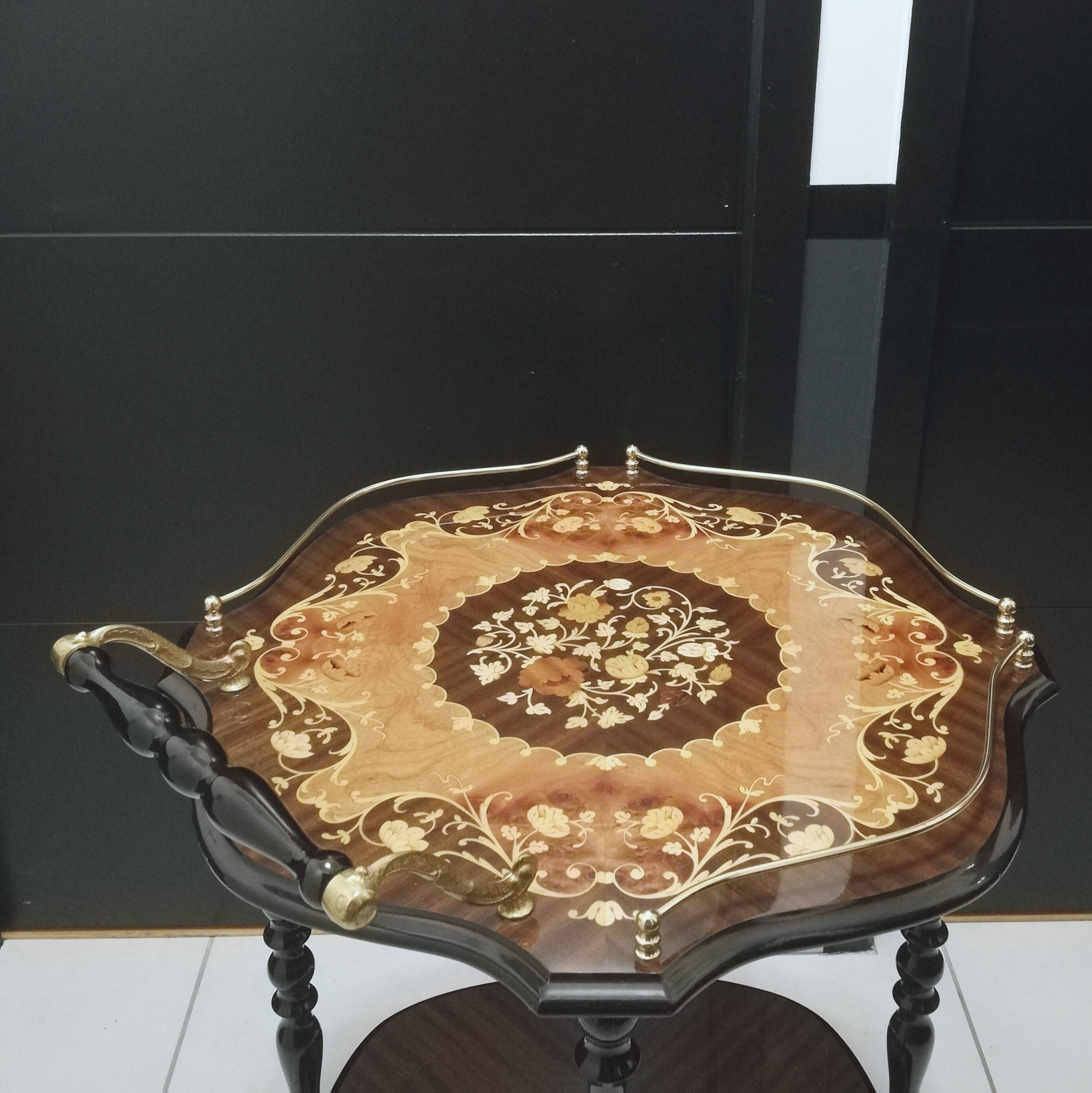 Marquetry trolley on wheels