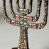 Menorah/Candlestick with 7 light arms. In old gold patinated brass/Decor 12 astrological signs. Engraved Jerusalem. Height 14 cm