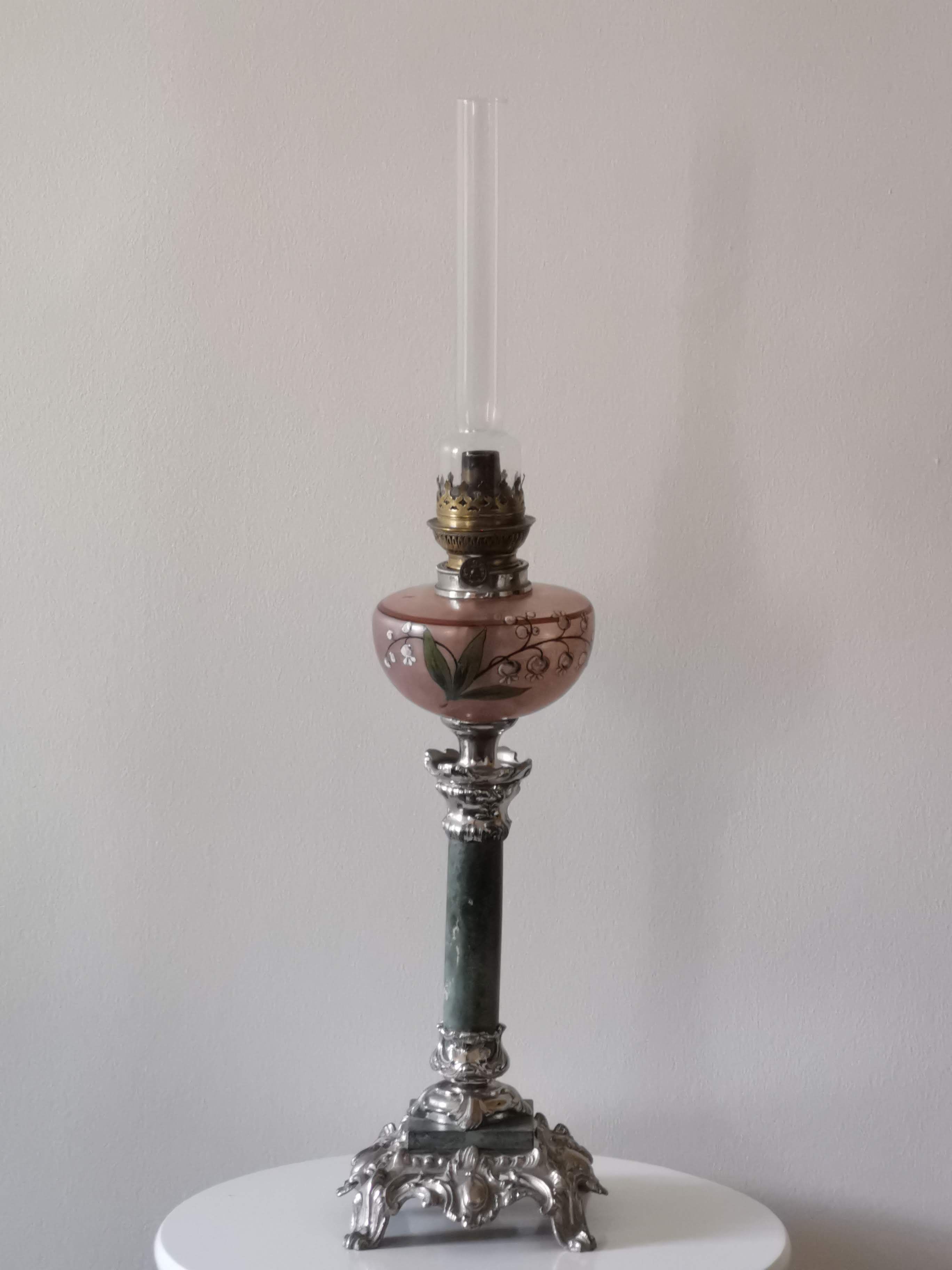 Kerosene lamp late nineteenth century mounted on Corinthian column.
