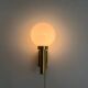 Large minimalist cinema wall light in opal glass and heavy brass, 1960s, Germany
