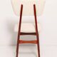 Beech wood armchair in cherry colour with cream boucle fabric - 20th century, Europe, 1960.