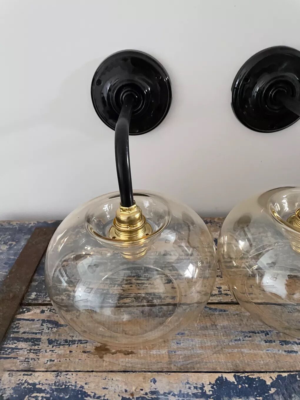 Pair of vintage electrified smoked glass wall lamps