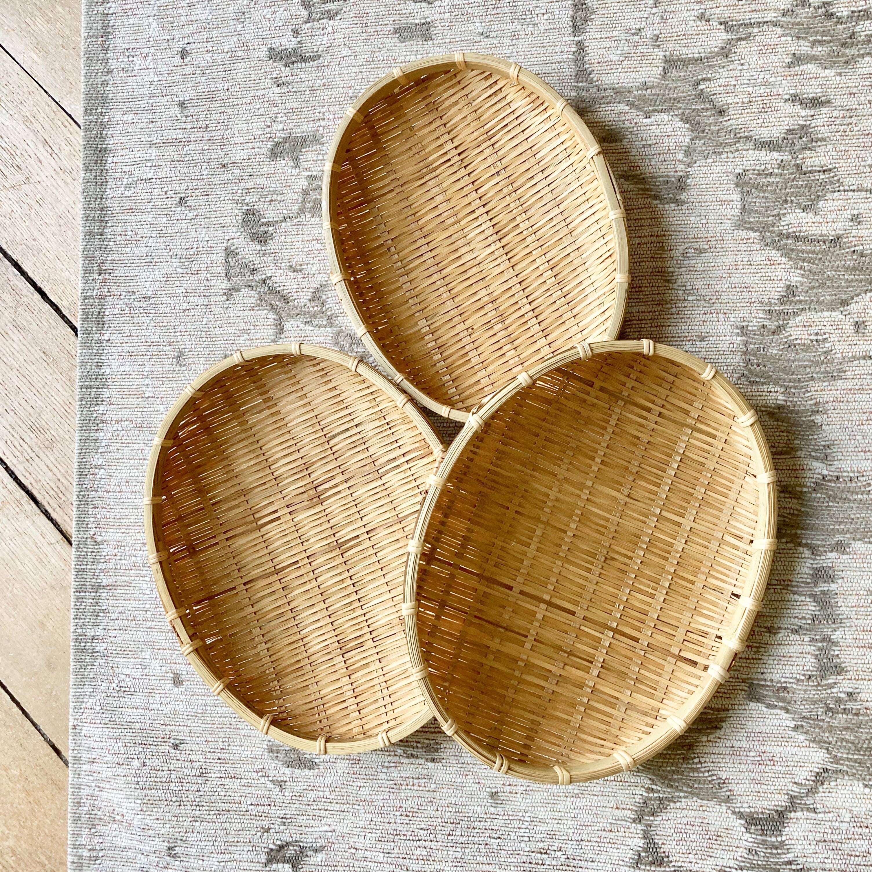 Three trundle baskets