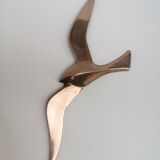 Stylized brass birds