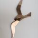 Stylized brass birds