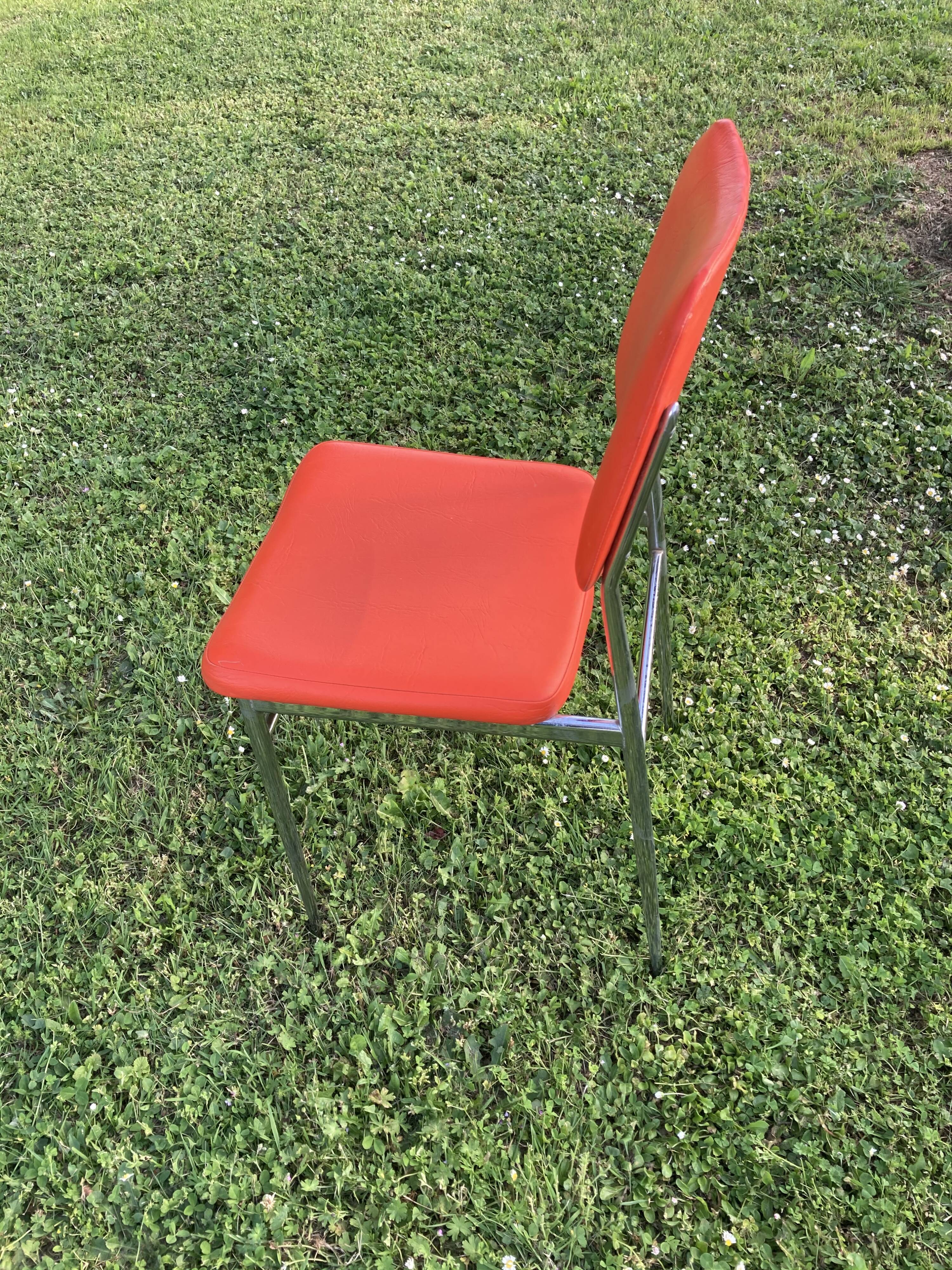 Series of 4 vintage orange chairs