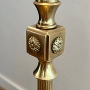 Neoclassical brass floor lamp with claw feet from Maison Jansen.