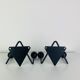 Pair of wall hooks from the 1950s, black metal
