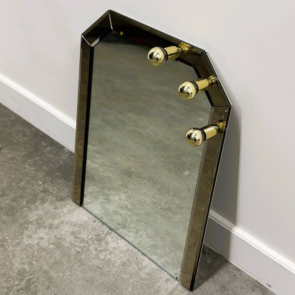 Vintage German brass & smoked mirror with architectural faceted top, 1980s.