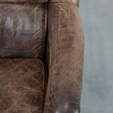 Very comfortable vintage cow leather armchair with beautiful colours