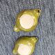 Set of 2 glazed khaki clay bowls.