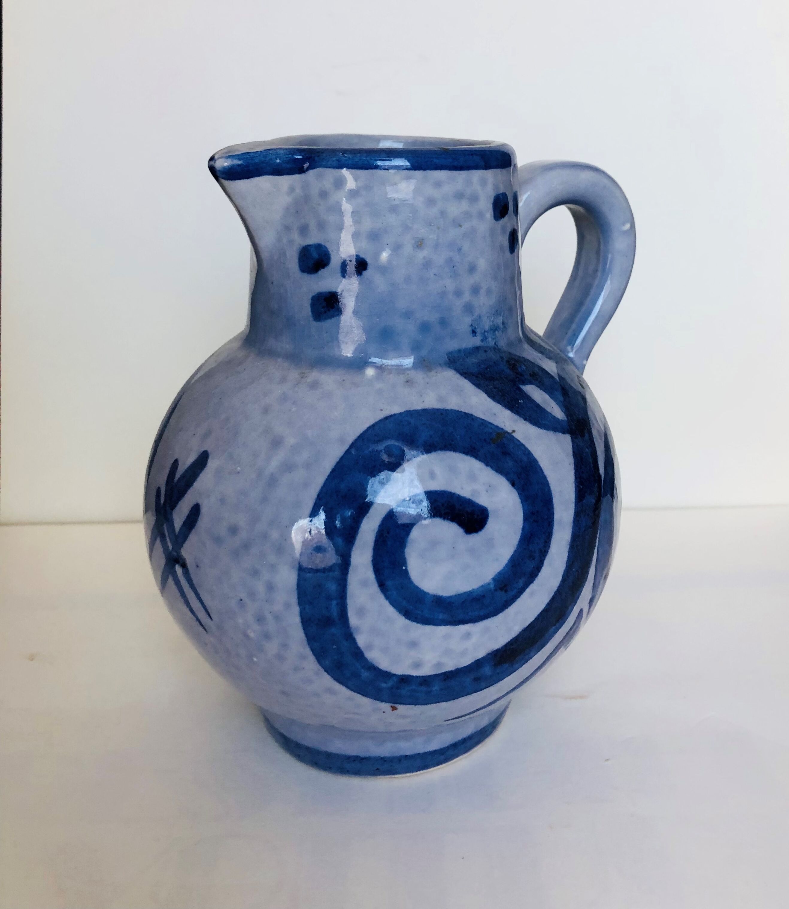 Pitcher in blue glazed stoneware