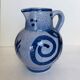 Pitcher in blue glazed stoneware