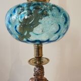 Large kerosene lamp mounted on bronze statue. Late nineteenth century