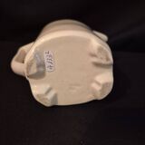 Vintage vase, geometric frieze and flowers with a black border.