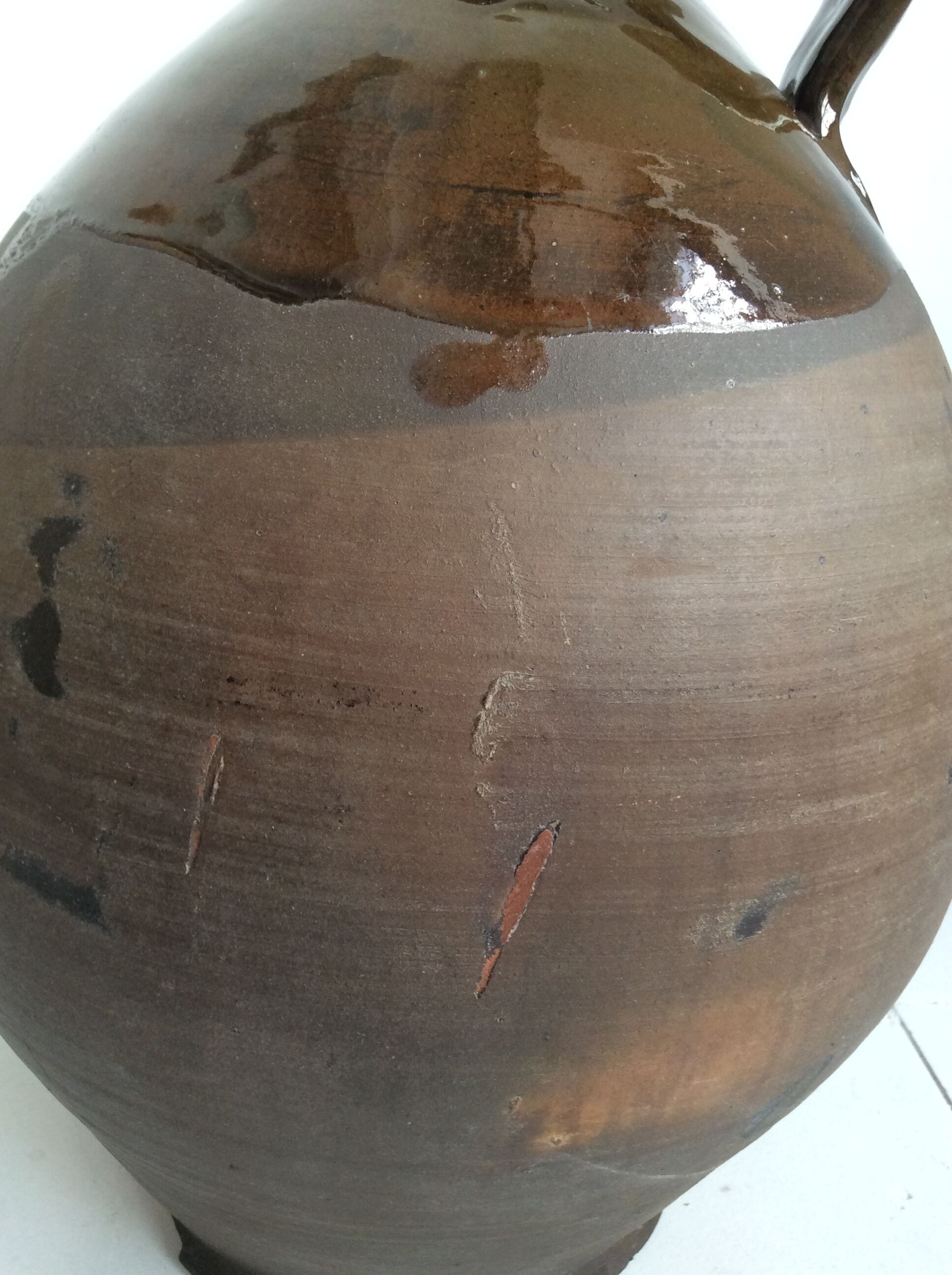 Old terracotta jug glazed Provençal