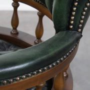 Dark green cowhide leather and wood chesterfield office chair on wheels