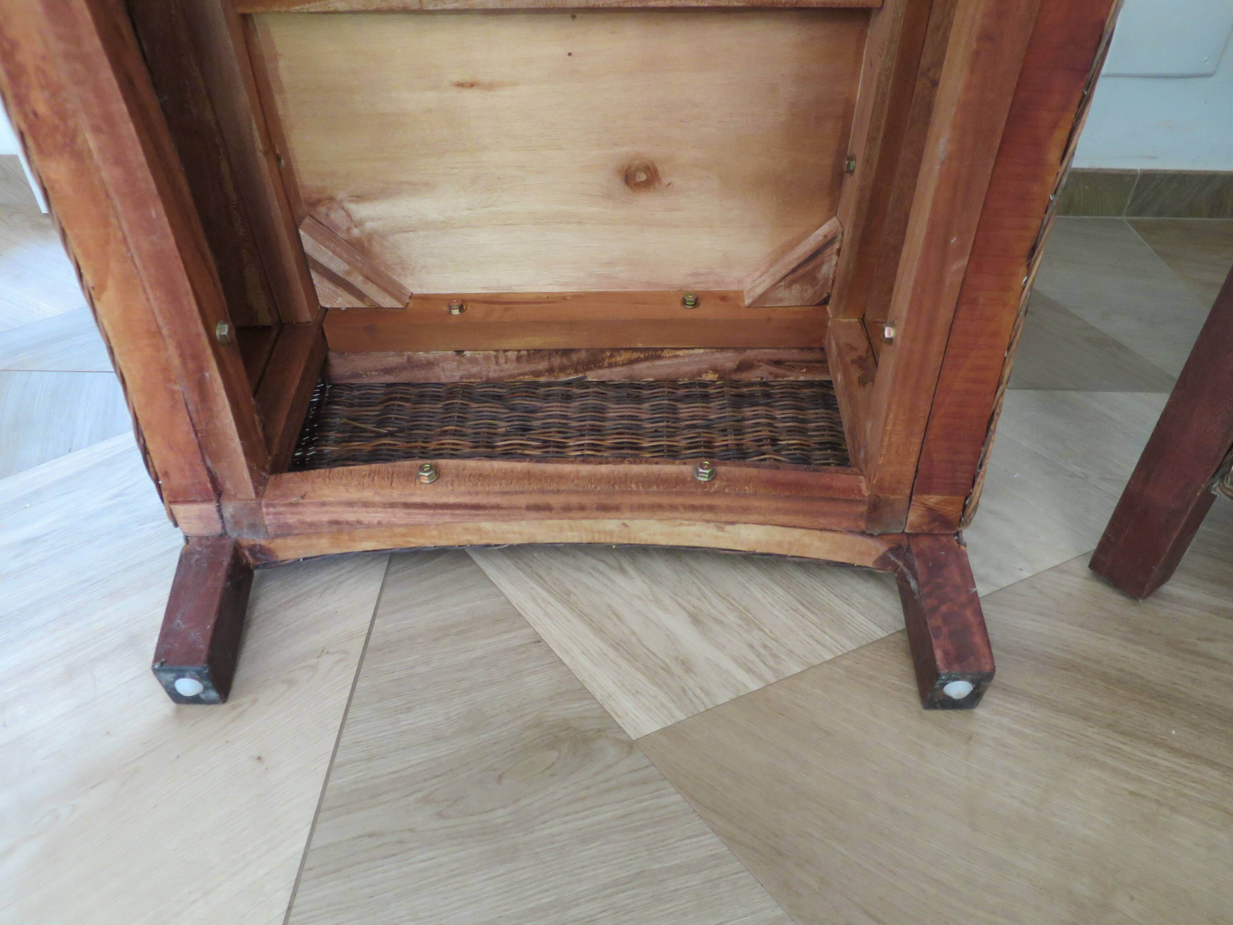 2 colonial-style armchairs in woven rattan and exotic wood