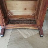 2 colonial-style armchairs in woven rattan and exotic wood