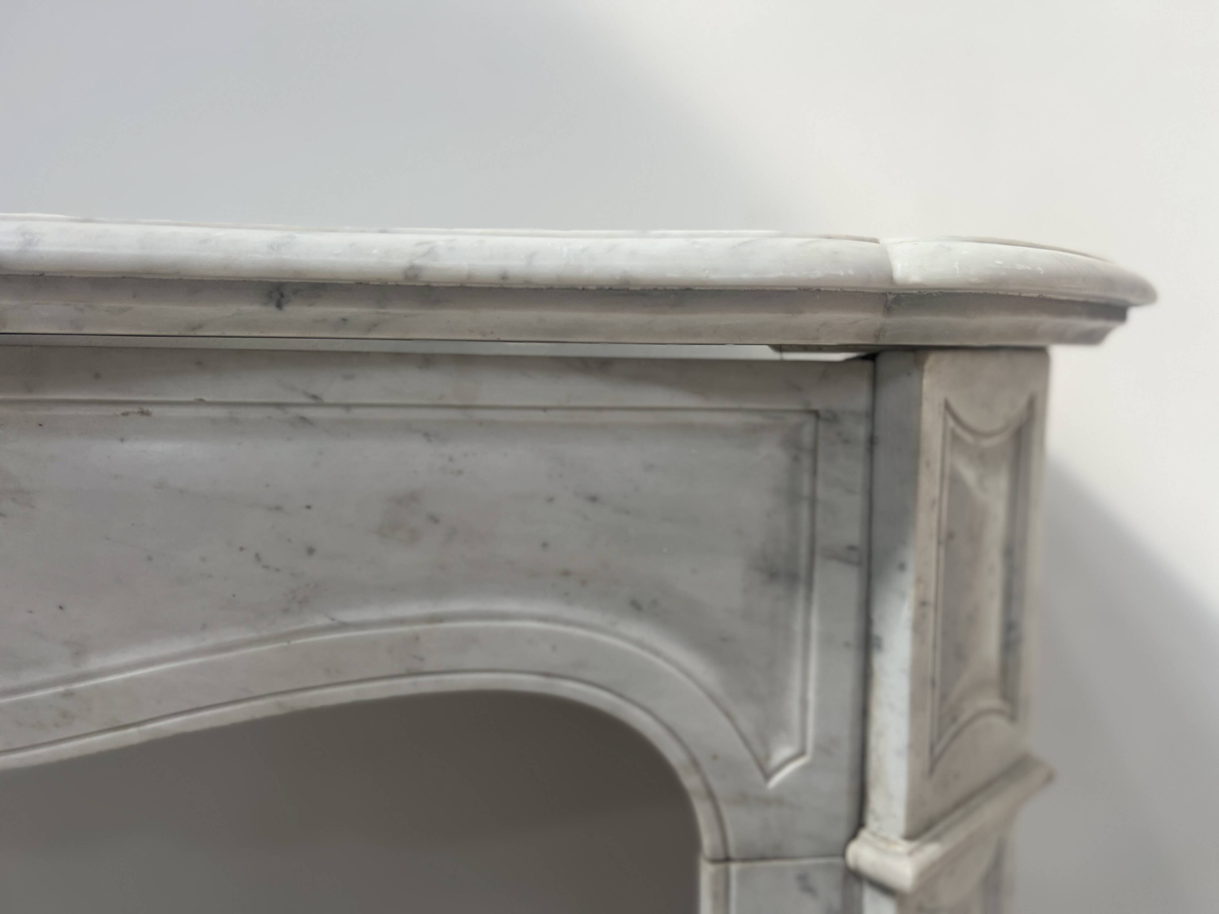 Louis XV style fireplace Model Pompadour White Carrara marble 20th century