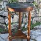 Empire style mahogany and mahogany veneer tripod pedestal table