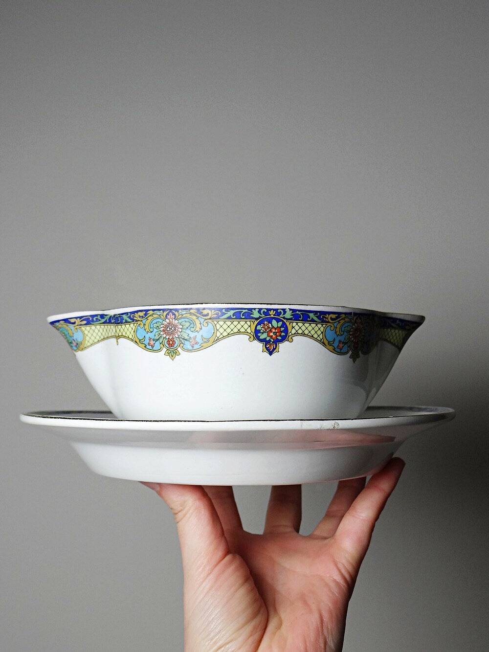 Old Lunéville sauce boat, opaque porcelain with polychrome decoration.