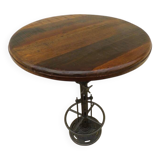 Unique bistro table with its adjustable industrial cast iron leg